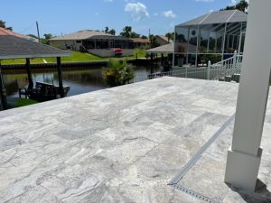 Travertine pool deck in Palm Coast home