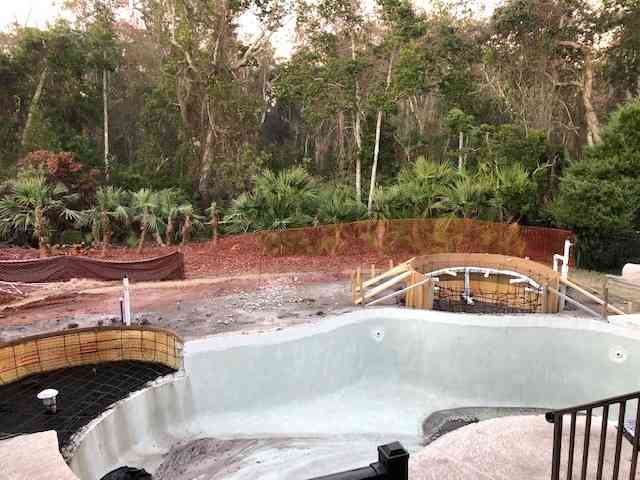 Existing pool getting remodeled to add a sun shelf and spa.