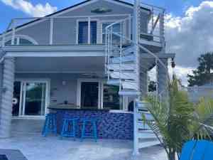 Palm Coast home remodel with balcony addition and summer kitchen