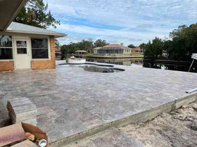 Travertine pool deck complete