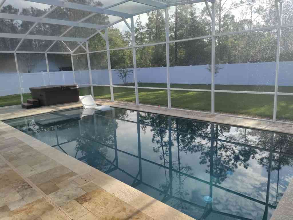 Gunite pool with sun shelf in Palm Coast ready to be enjoyed.