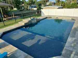 Custom pool in Palm Coast with sun shelf