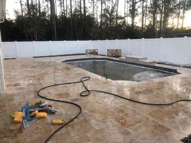 travertine pavers over concrete sub deck