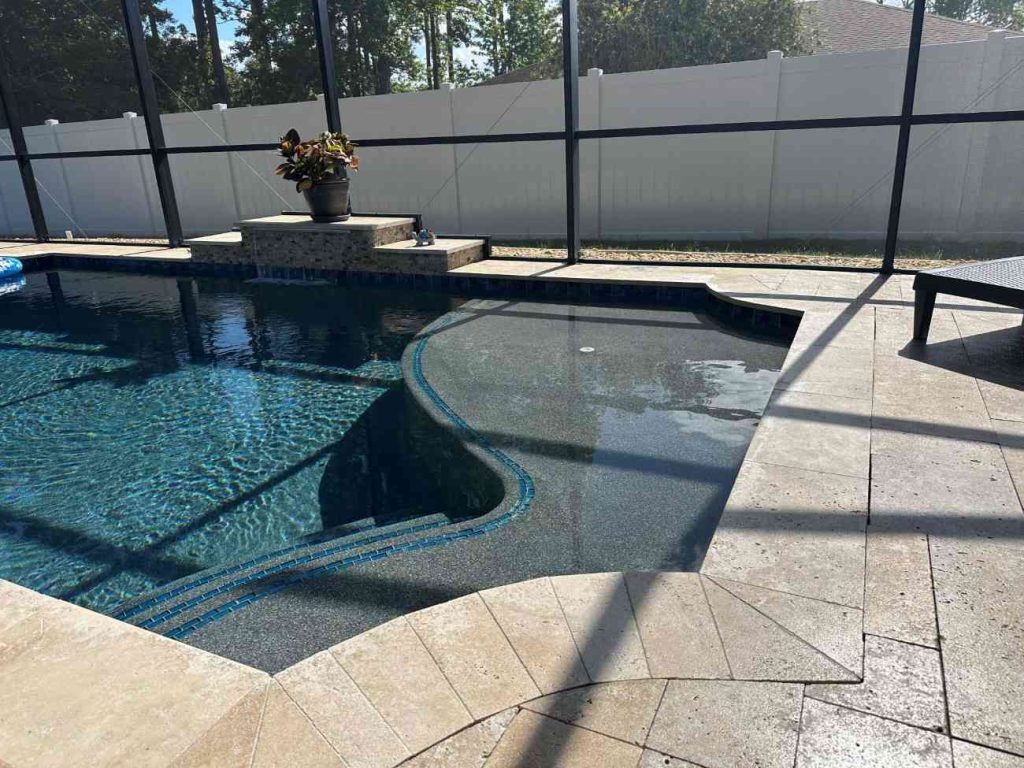 Close-up of tanning ledge in custom pool built in Palm Coast