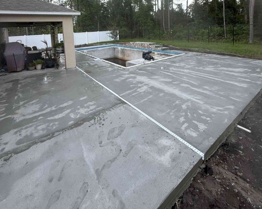 concrete sub deck ready for travertine pavers