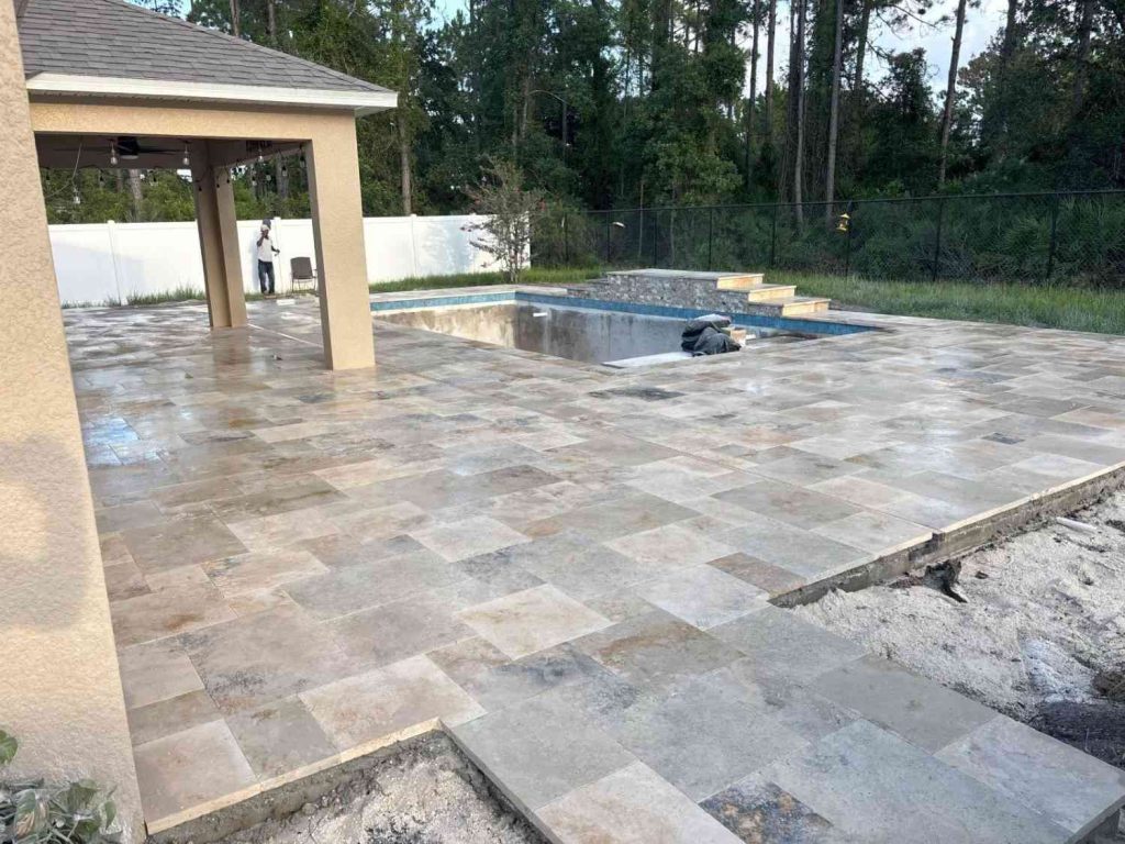 Travertine paver deck installation