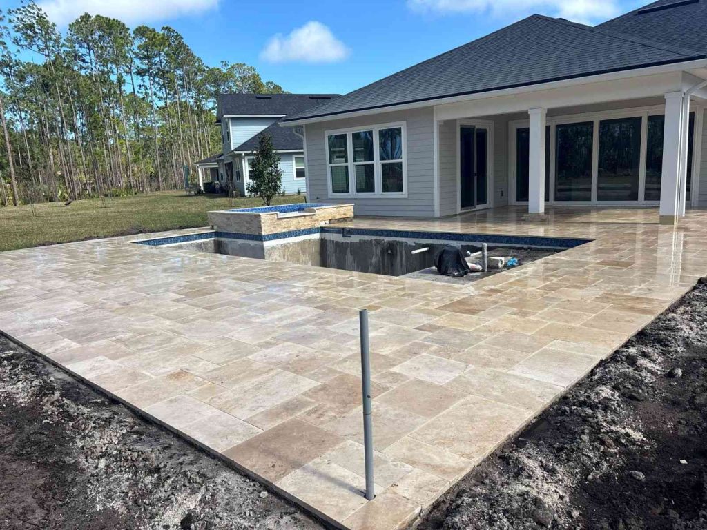 Travertine paver deck installation