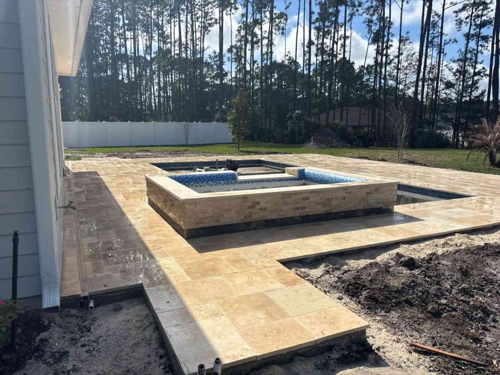 raised spa with spillover and rolled-edge
