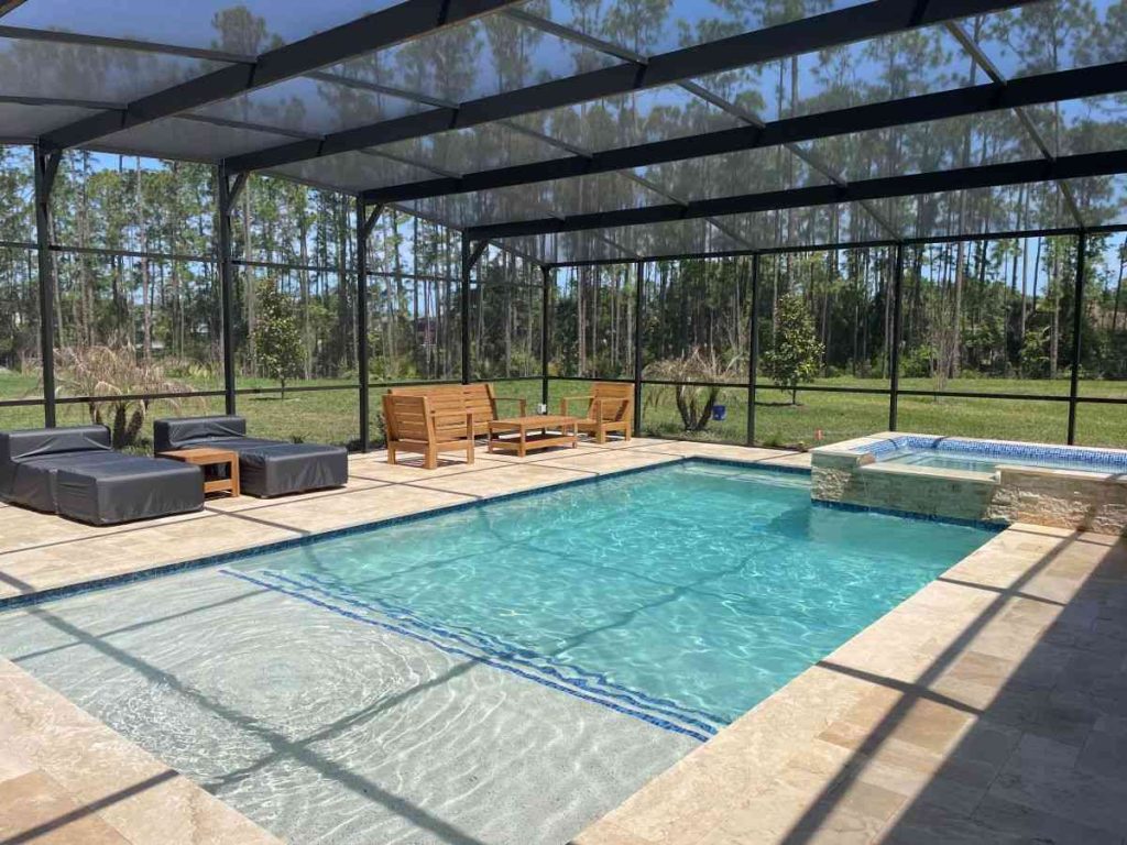 custom pool with raised spa and sun shelf in Palm Coast's P-section