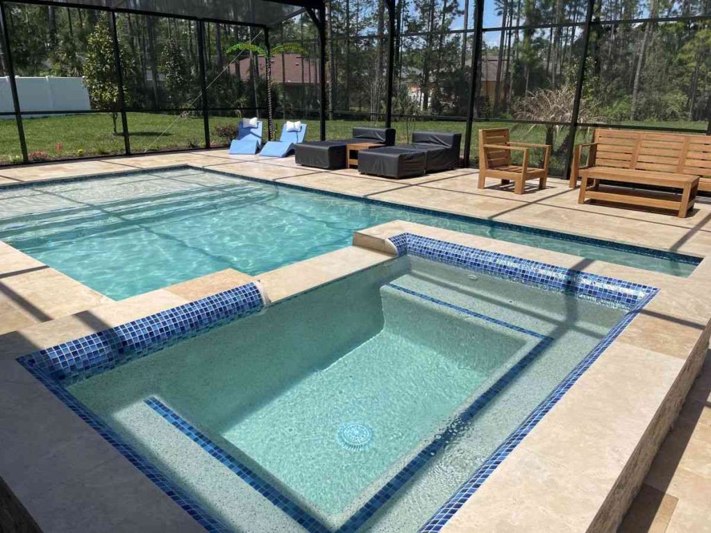 custom pool with raised spa and sun shelf in Palm Coast's P-section