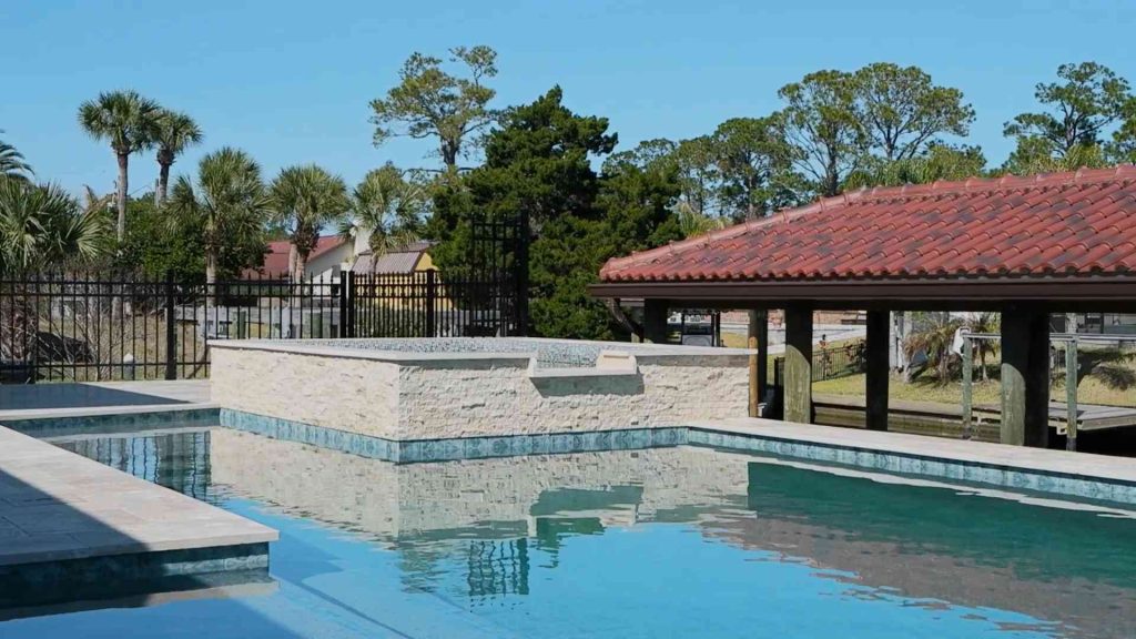 Custom waterfront pool with spa construction in Palm Coast's C section